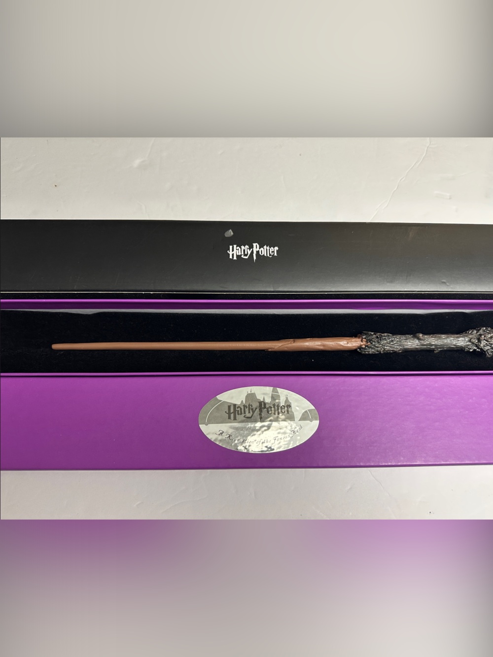 Warner Bros. Harry Potter Wand in Purple and Black Presentation Box